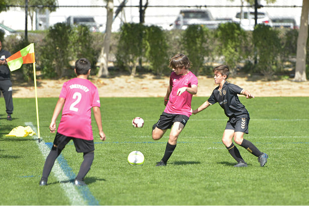 Boy Kicking a Ball Footbal-Galaxy Academy