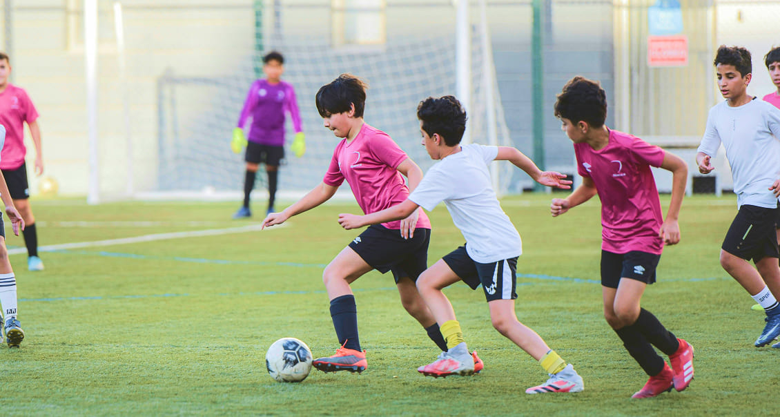 Boy Run with Ball Footbal-Galaxy Academy