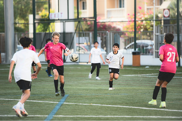 Kids Looking a Ball Footbal-Galaxy Academy